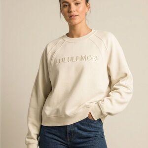 Lululemon Embroidered Scuba Crewneck Sweatshirt in colour Bone